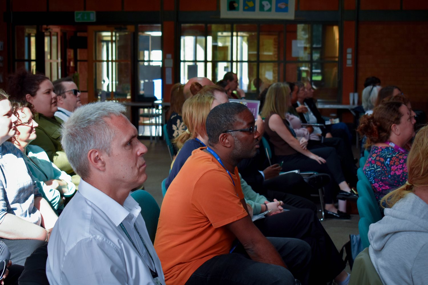Accommodation Concern AGM attendees listening