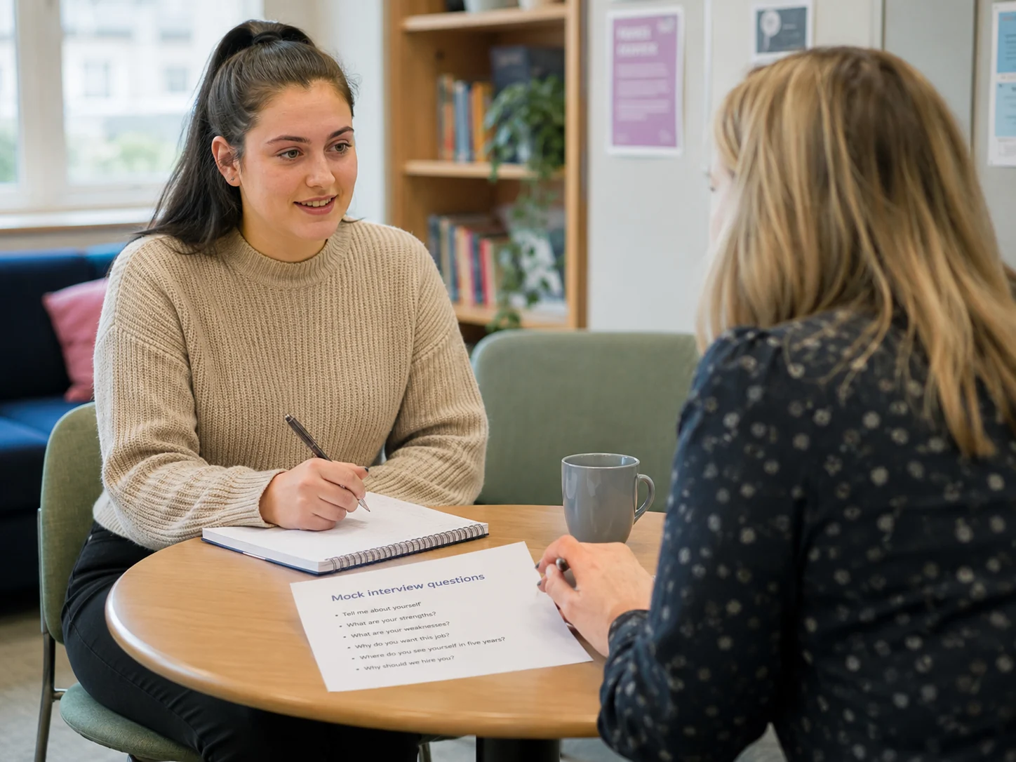 An employability adviser supporting someone to plan their next steps