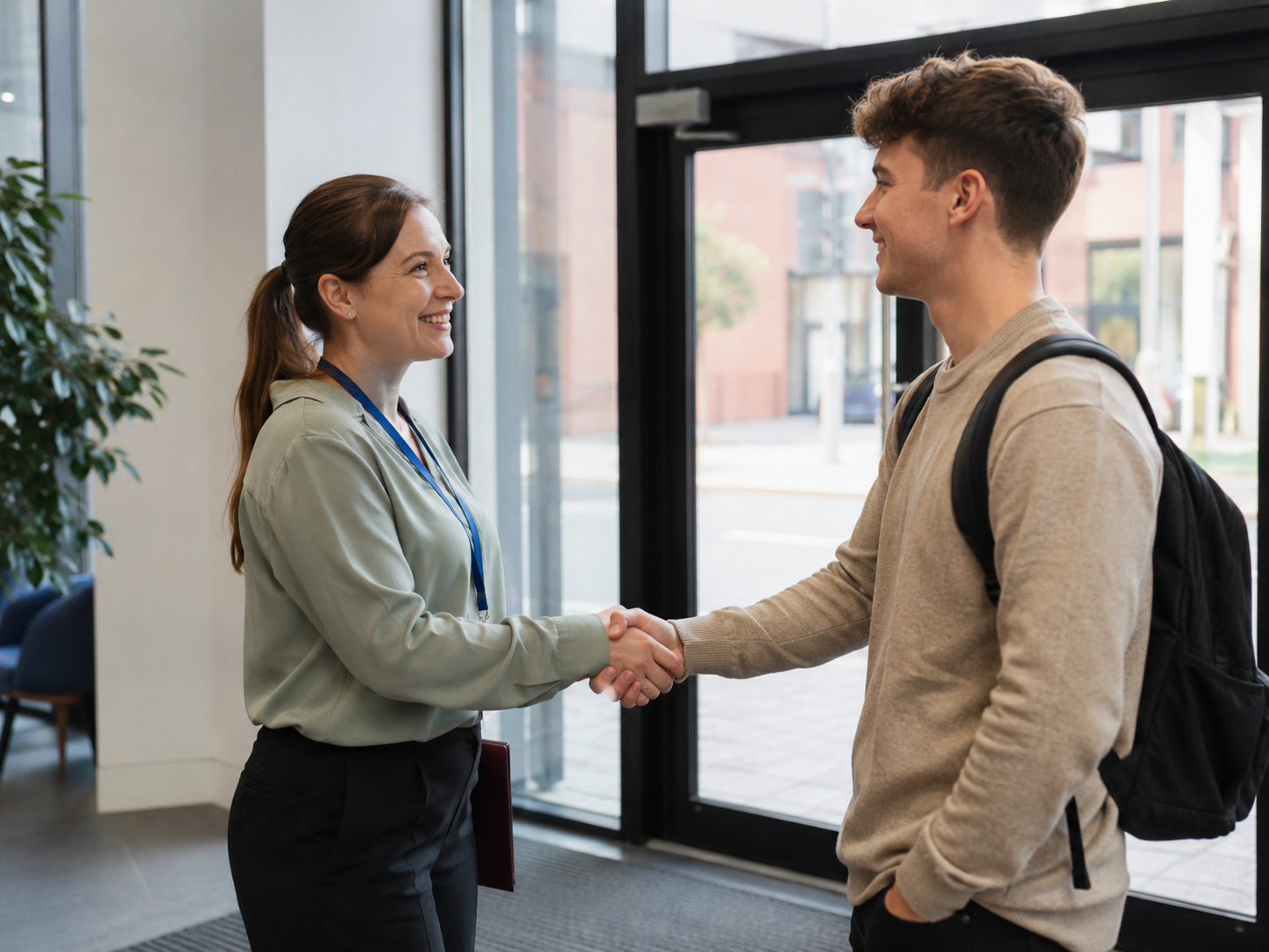 A supportive handshake during an employability appointment