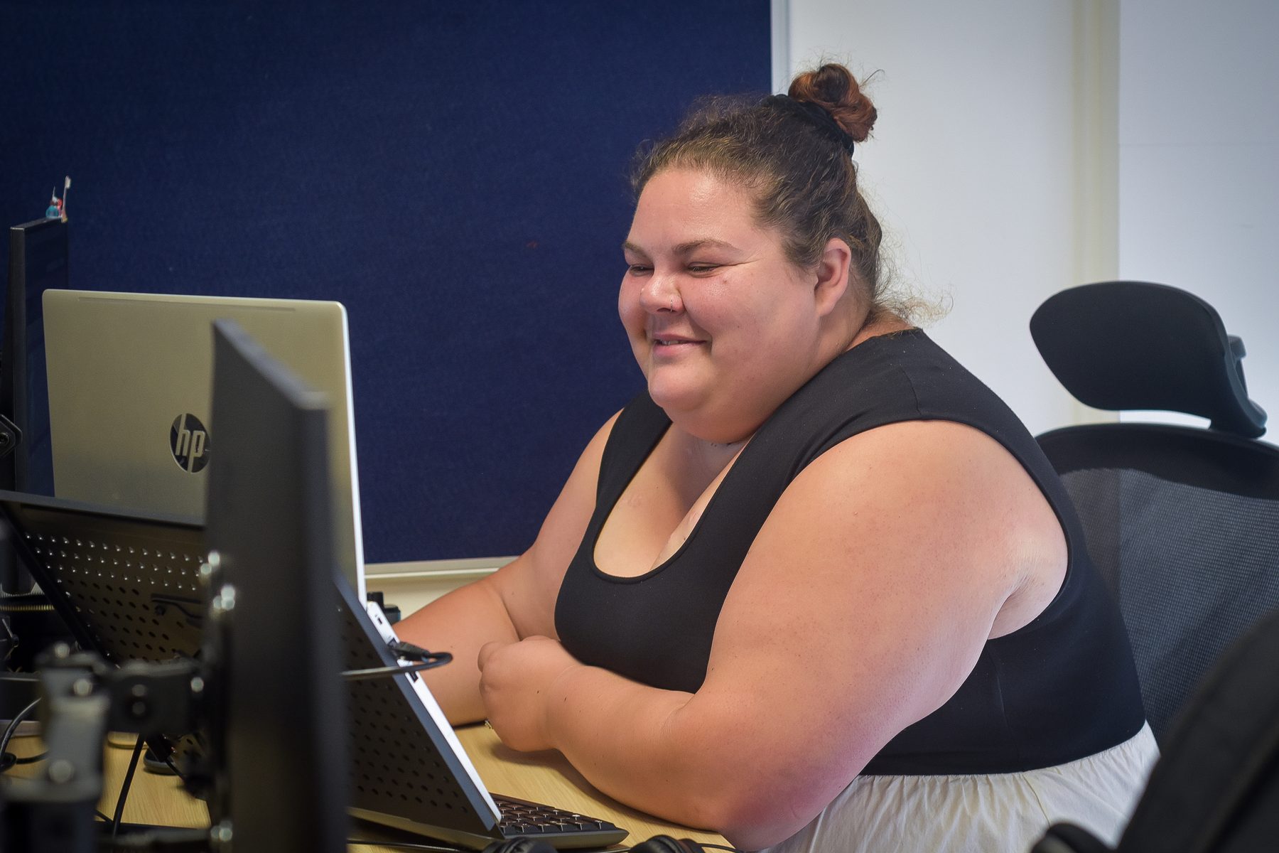 Accommodation Concern team member supporting a client by phone