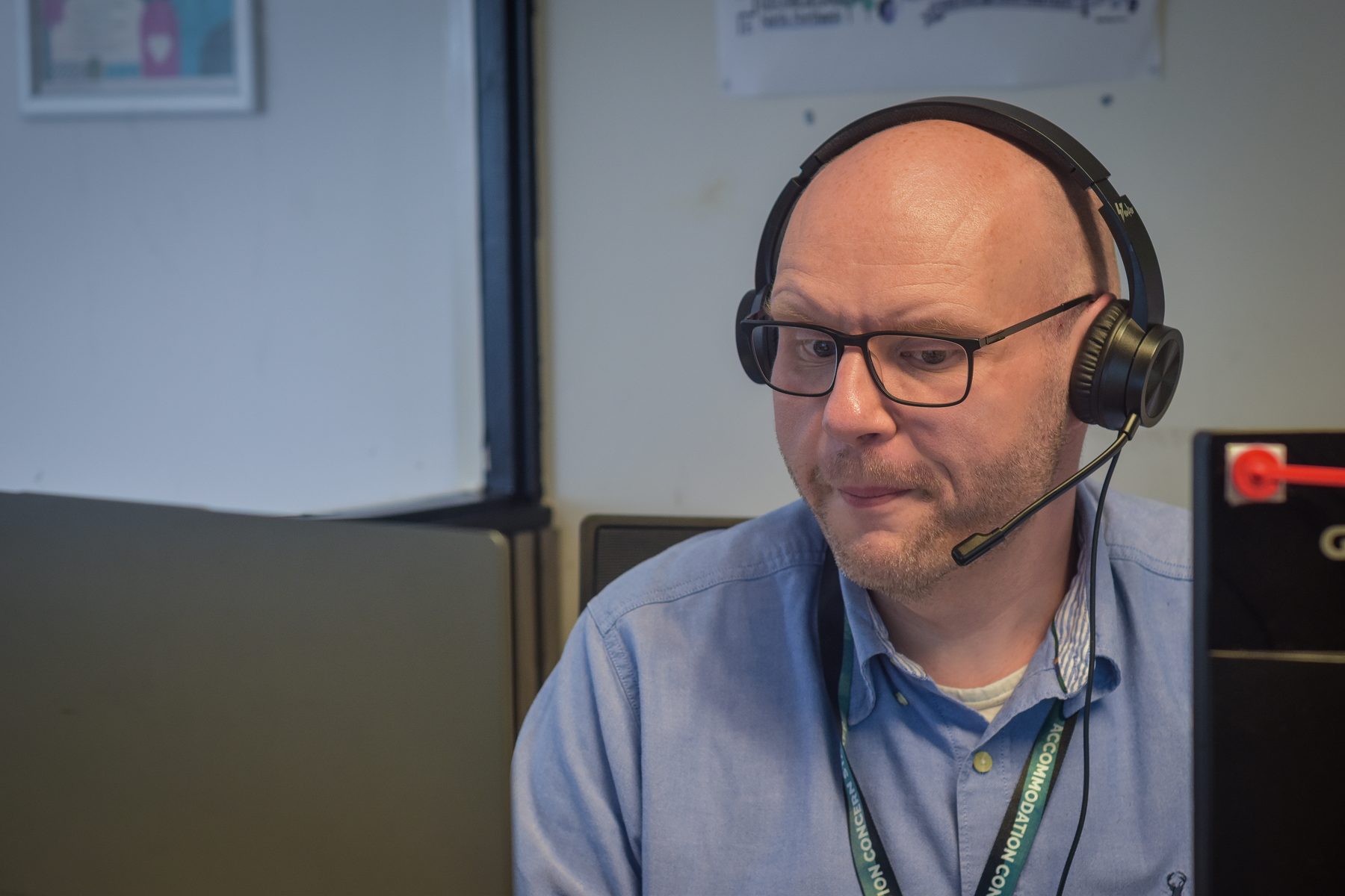 Accommodation Concern adviser working with a headset