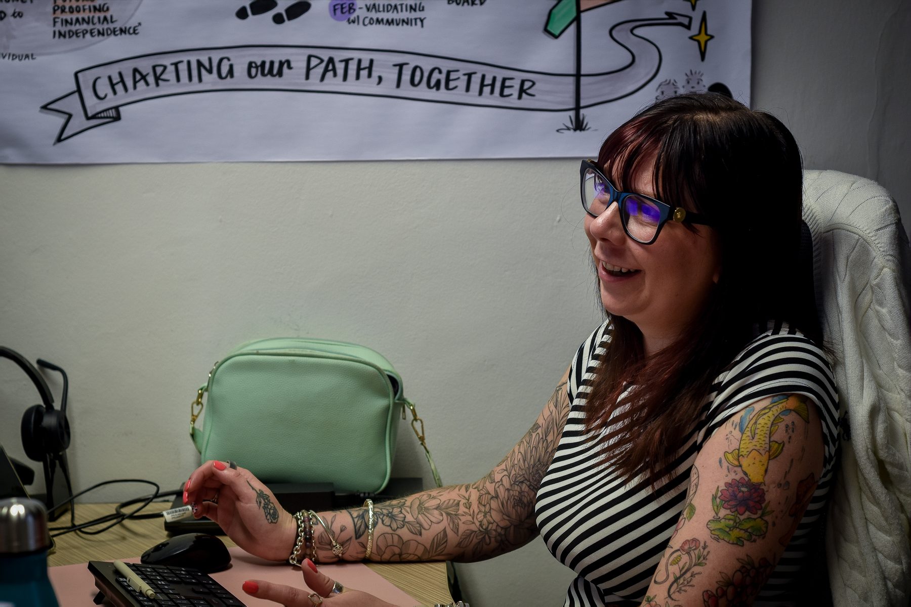 Accommodation Concern team member working at a desk